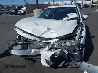 2018 Honda Civic EX with VIN 2HGFC2F71JH502564, listed as a IAAI auction lot 41933157 with 56,696 mi miles and . Bid and sale history available at DreamBid. Image 6.