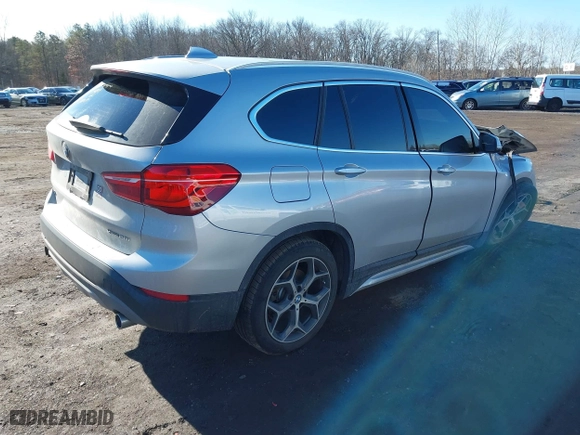 2018 BMW X1 xDrive28i with VIN WBXHT3C36J5L33781, listed as a IAAI auction lot 41497360 with 61,251 mi miles. Bid and sale history available at carsss.com. Image 4.