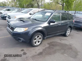 2009 Subaru Forester with VIN JF2SH65629H705318, listed as a IAAI auction lot 42120698 with 194,582 mi miles and . Bid and sale history available at DreamBid. Image 2.