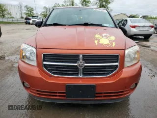 2010 Dodge Caliber Mainstreet z VIN 1B3CB3HA5AD591279, wystawiony jako Copart lot #57794645 z przebiegiem 200 007 mil mil oraz Szkoda całkowita • Salvage title. Historia ofert i sprzedaży dostępna na DreamBid. Obrazek 5.