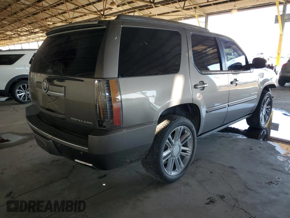 2012 Cadillac Escalade Premium z VIN 1GYS4CEF9CR225037, wystawiony jako Copart lot #50270415 z przebiegiem 172 483 mil mil oraz Szkody całkowita. Historia ofert i sprzedaży dostępna na DreamBid. Obrazek 3.