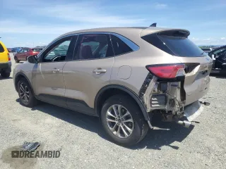2021 Ford Escape SE with VIN 1FMCU0G66MUB34372, listed as a Copart auction lot 56595405 with 42,355 mi miles and Salvage title. Bid and sale history available at DreamBid. Image 2.