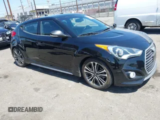 2016 Hyundai Veloster Turbo z VIN KMHTC6AE2GU252560, wystawiony jako IAAI lot #42538562 z przebiegiem 134 125 mil mil oraz . Historia ofert i sprzedaży dostępna na DreamBid. Obrazek 1.