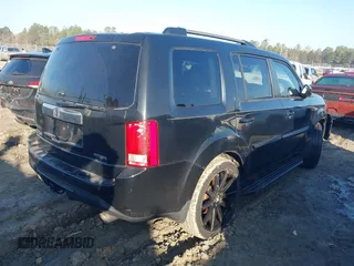 2015 Honda Pilot Touring with VIN 5FNYF3H94FB014659, listed as a IAAI auction lot 41474827 with 109,531 mi miles. Bid and sale history available at carsss.com. Image 4.