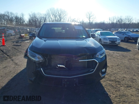 2018 Chevrolet Traverse Premier z VIN 1GNEVJKW5JJ174261, wystawiony jako IAAI lot #41656906 z przebiegiem 101 908 mil mil oraz . Historia ofert i sprzedaży dostępna na DreamBid. Obrazek 12.