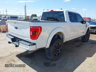 2021 Ford F-150 XL with VIN 1FTFW1E54MFC82133, listed as a IAAI auction lot 42170024 with 24,548 mi miles and . Bid and sale history available at DreamBid. Image 4.