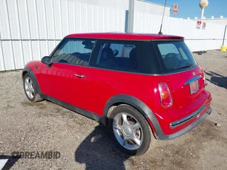 2003 MINI Hardtop with VIN WMWRC33413TC48601, listed as a IAAI auction lot 41418901 with 57,095 mi miles and . Bid and sale history available at DreamBid. Image 3.