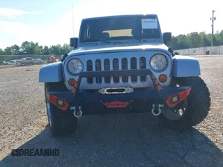 2016 Jeep Wrangler Sahara z VIN 1C4AJWBGXGL120329, wystawiony jako IAAI lot #40239916 z przebiegiem 96 731 mil mil oraz . Historia ofert i sprzedaży dostępna na DreamBid. Obrazek 12.