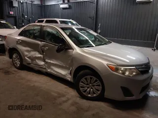 2013 Toyota Camry L with VIN 4T1BF1FK3DU716634, listed as a IAAI auction lot 41759908 with 118,955 mi miles. Bid and sale history available at carsss.com. Image 1.