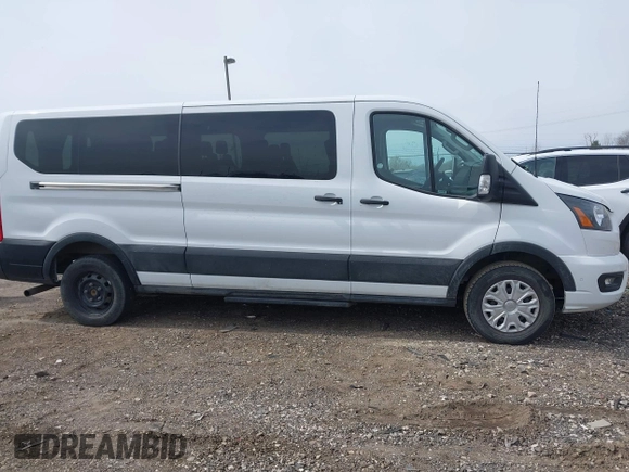 2023 Ford Transit Passenger XL with VIN 1FBAX2YG0PKA92257, listed as a IAAI auction lot 41996145 with 61,932 mi miles and . Bid and sale history available at DreamBid. Image 13.