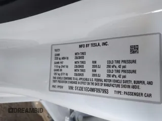 2021 Tesla Model 3 Performance with VIN 5YJ3E1EC4MF097993, listed as a IAAI auction lot 41366615 with 30,735 mi miles and . Bid and sale history available at DreamBid. Image 9.
