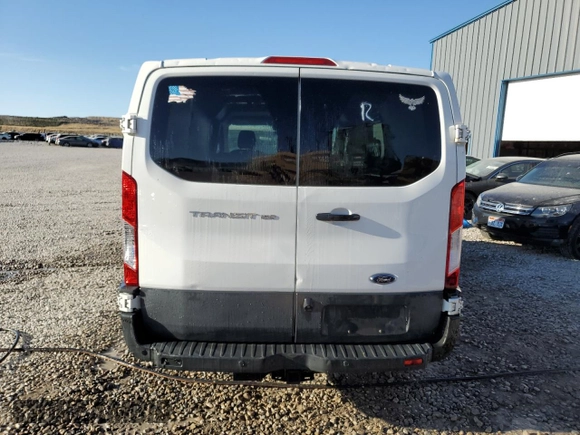 2017 Ford Transit z VIN 1FTYE1YM4HKA73728, wystawiony jako Copart lot #59231565 z przebiegiem 169 458 mil mil oraz Czysty tytuł • Clean title. Historia ofert i sprzedaży dostępna na DreamBid. Obrazek 7.