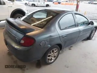 2002 Dodge Neon SXT with VIN 1B3ES56C02D596769, listed as a IAAI auction lot 41849459 with 191,629 mi miles. Bid and sale history available at carsss.com. Image 4.