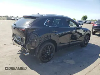2023 Mazda CX-30 Premium Plus with VIN 3MVDMBEY0PM578346, listed as a Copart auction lot 58572345 with 14,027 mi miles and Salvage title. Bid and sale history available at DreamBid. Image 3.