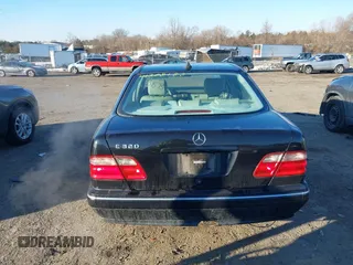 2002 Mercedes-Benz E-Class with VIN WDBJF65J32B485019, listed as a IAAI auction lot 41388188 with 119,417 mi miles. Bid and sale history available at carsss.com. Image 16.