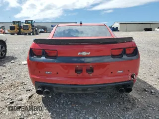 2013 Chevrolet Camaro LS z VIN 2G1FE1E32D9207577, wystawiony jako Copart lot #57692525 z przebiegiem 89 453 mil mil oraz Czysty tytuł • Clean title. Historia ofert i sprzedaży dostępna na DreamBid. Obrazek 6.