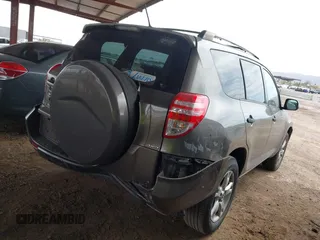 2009 Toyota RAV4 with VIN JTMBK33V895074715, listed as a IAAI auction lot 41802446 with 215,892 mi miles. Bid and sale history available at carsss.com. Image 13.