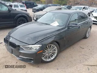 2015 BMW 3 Series 335i xDrive with VIN WBA3B9G58FNR94113, listed as a IAAI auction lot 41782667 with 106,089 mi miles and . Bid and sale history available at carsss.com. Image 2.