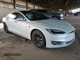 2019 Tesla Model S 100D with VIN 5YJSA1E45KF330633, listed as a Copart auction lot 49329745 with 74,047 mi miles and Salvage title. Bid and sale history available at DreamBid. Image 4.