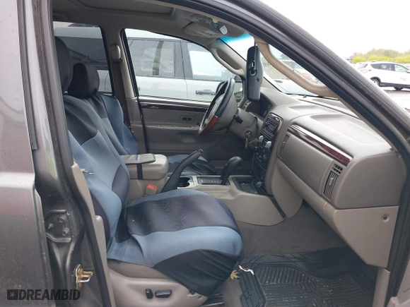 2004 Jeep Grand Cherokee Limited with VIN 1J4GW58N34C399673, listed as a IAAI auction lot 41976505 with 194,005 mi miles. Bid and sale history available at carsss.com. Image 5.