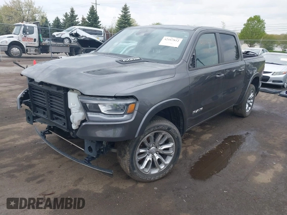 2022 Ram 1500 Laramie with VIN 1C6SRFJT3NN400159, listed as a IAAI auction lot 42167812 with 16,790 mi miles and . Bid and sale history available at DreamBid. Image 2.