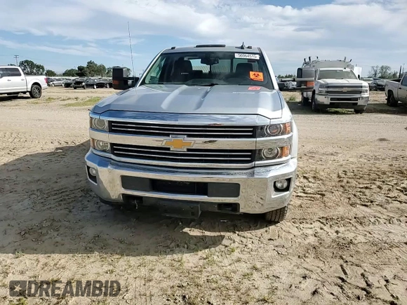 2015 Chevrolet Silverado 3500HD LT z VIN 1GC4KZCG1FF586027, wystawiony jako Copart lot #50064515 z przebiegiem 63 788 mil mil oraz Szkoda całkowita • Salvage title. Historia ofert i sprzedaży dostępna na DreamBid. Obrazek 11.