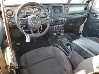 2023 Jeep Gladiator Sport S with VIN 1C6HJTAG4PL528847, listed as a Copart auction lot 64470375 with 36,177 mi miles and Salvage title. Bid and sale history available at DreamBid. Image 8.