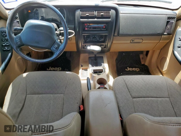1999 Jeep Cherokee Sport с VIN 1J4FT68S5XL675839, выставлен на аукционе Copart как лот 65230005 с пробегом 204 102 миль миль и Списание • Salvage title. История ставок и продаж доступна на DreamBid. Изображение 8.