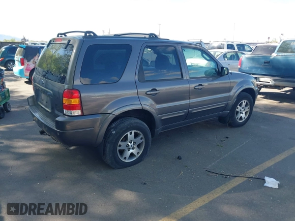 2003 Ford Escape Limited with VIN 1FMCU94173KB02067, listed as a IAAI auction lot 42088659 with 236,209 mi miles. Bid and sale history available at carsss.com. Image 4.