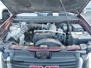 2005 GMC Envoy SLT with VIN 1GKDT13S452115924, listed as a IAAI auction lot 41443704 with 215,402 mi miles. Bid and sale history available at carsss.com. Image 10.