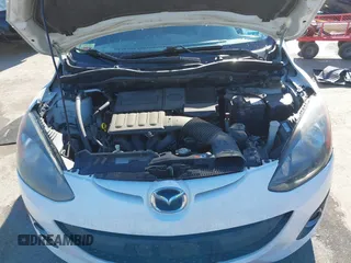 2012 Mazda 2 Touring z VIN JM1DE1LY2C0134281, wystawiony jako IAAI lot #41613690 z przebiegiem 156 546 mil mil oraz . Historia ofert i sprzedaży dostępna na DreamBid. Obrazek 10.