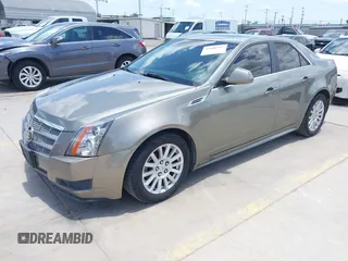 2010 Cadillac CTS Luxury with VIN 1G6DG5EG6A0148433, listed as a IAAI auction lot 42686517 with 106,701 mi miles and . Bid and sale history available at DreamBid. Image 2.