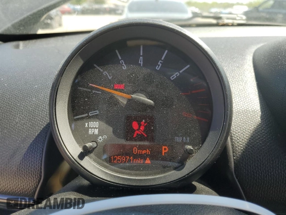 2015 MINI Countryman S with VIN WMWZC3C52FWT05882, listed as a Copart auction lot 54399525 with 125,971 mi miles and Salvage title. Bid and sale history available at DreamBid. Image 9.