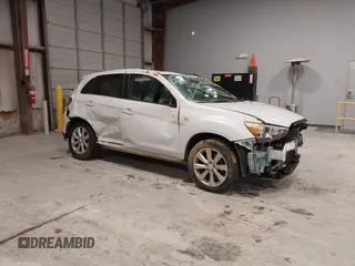 2014 Mitsubishi Outlander SE z VIN 4A4AP4AU6EE027621, wystawiony jako IAAI lot #41565333 z przebiegiem 148 744 mil mil oraz . Historia ofert i sprzedaży dostępna na DreamBid. Obrazek 1.