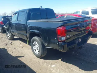 2023 Toyota Tacoma SR with VIN 3TMCZ5AN9PM555191, listed as a IAAI auction lot 41935645 with 31,580 mi miles and . Bid and sale history available at DreamBid. Image 3.