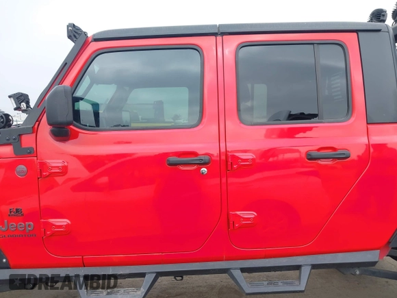 2020 Jeep Gladiator Rubicon with VIN 1C6JJTBG4LL178260, listed as a IAAI auction lot 42602460 with 61,899 mi miles and . Bid and sale history available at DreamBid. Image 14.