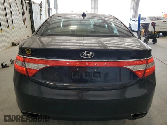 2013 Hyundai Azera z VIN KMHFG4JG1DA217528, wystawiony jako Copart lot #56123655 z przebiegiem 148 606 mil mil oraz Szkoda całkowita • Salvage title. Historia ofert i sprzedaży dostępna na DreamBid. Obrazek 6.
