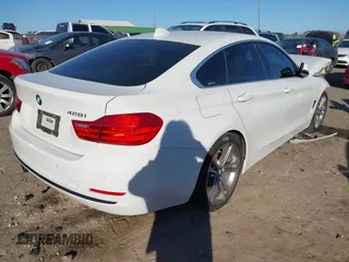 2016 BMW 4 Series 428i with VIN WBA4A9C56GGL87968, listed as a IAAI auction lot 41441524 with 134,065 mi miles. Bid and sale history available at carsss.com. Image 4.