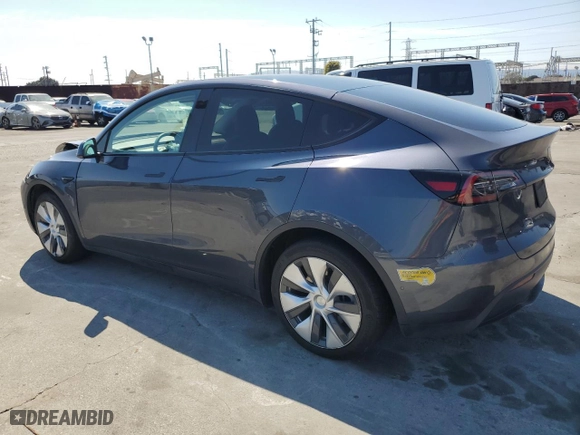 2022 Tesla Model Y Long Range with VIN 7SAYGAEE1NF486077, listed as a Copart auction lot 50526795 with 24,858 mi miles and Salvage Title. Bid and sale history available at carsss.com. Image 2.
