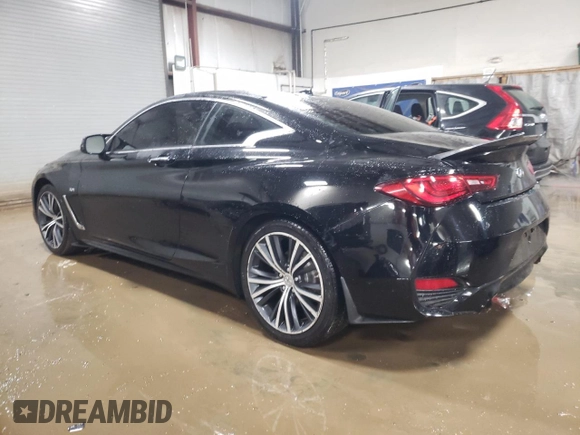2018 Infiniti Q60 Luxe with VIN JN1EV7EL7JM392006, listed as a Copart auction lot 85520894 with 60,565 mi miles and Salvage title. Bid and sale history available at DreamBid. Image 2.