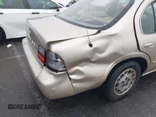 1995 Nissan Maxima GLE z VIN JN1CA21DXST075946, wystawiony jako IAAI lot #41669451 z przebiegiem 154 423 mil mil oraz . Historia ofert i sprzedaży dostępna na DreamBid. Obrazek 20.