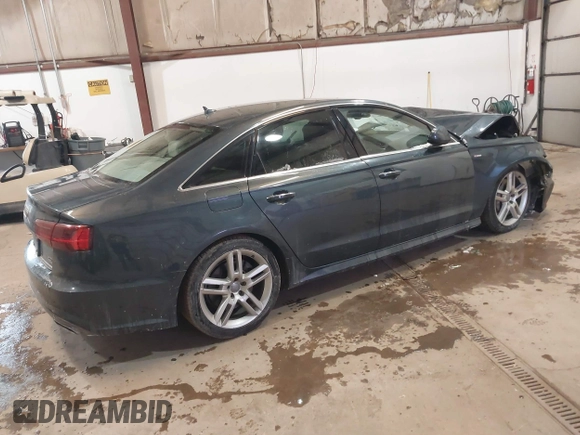 2016 Audi A6 2.0T Premium Plus with VIN WAUGFAFC8GN088505, listed as a IAAI auction lot 41569043 with 98,528 mi miles. Bid and sale history available at carsss.com. Image 4.