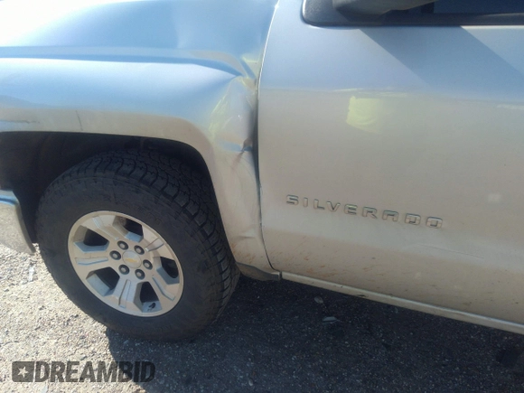 2014 Chevrolet Silverado 1500 LT with VIN 1GCVKREC7EZ120159, listed as a IAAI auction lot 41191282 with 206,836 mi miles and . Bid and sale history available at DreamBid. Image 19.