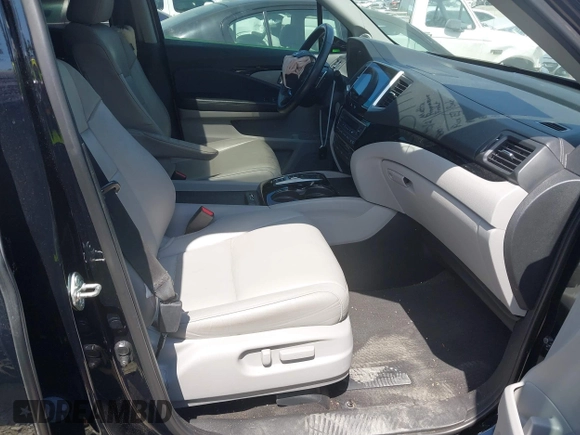 2017 Honda Pilot Touring с VIN 5FNYF5H9XHB024868, выставлен на аукционе IAAI как лот 42300608 с пробегом 133 018 миль миль и . История ставок и продаж доступна на DreamBid. Изображение 5.
