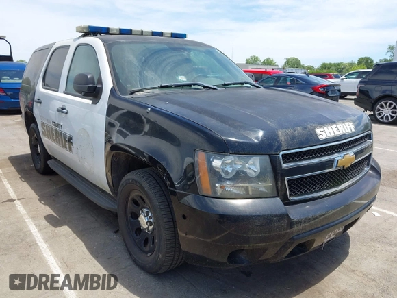 2013 Chevrolet Tahoe Commercial z VIN 1GNLC2E00DR337995, wystawiony jako IAAI lot #42213635 z przebiegiem Nie podano mil oraz . Historia ofert i sprzedaży dostępna na DreamBid. Obrazek 1.