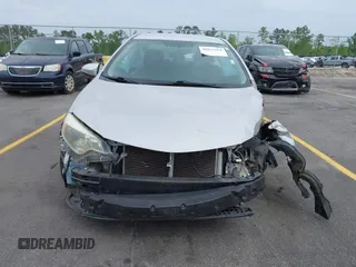 2014 Toyota Corolla L с VIN 2T1BURHE3EC098956, выставлен на аукционе IAAI как лот 41975655 с пробегом 110 663 миль миль и . История ставок и продаж доступна на DreamBid. Изображение 13.