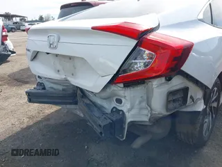 2018 Honda Civic EX с VIN 2HGFC2F7XJH514230, выставлен на аукционе IAAI как лот 41753552 с пробегом 137 232 миль миль и . История ставок и продаж доступна на DreamBid. Изображение 21.