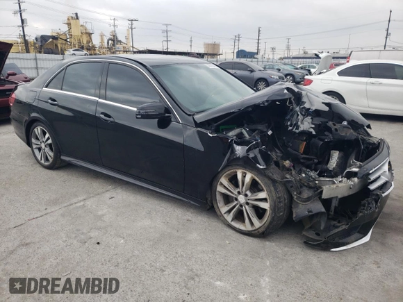 2014 Mercedes-Benz E 350 Sport with VIN WDDHF5KB7EB050618, listed as a Copart auction lot 50875045 with 157,722 mi miles and Salvage Title. Bid and sale history available at DreamBid. Image 4.