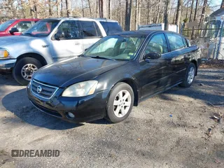 2002 Nissan Altima S with VIN 1N4AL11D52C264731, listed as a IAAI auction lot 41242713 with 189,741 mi miles. Bid and sale history available at carsss.com. Image 2.