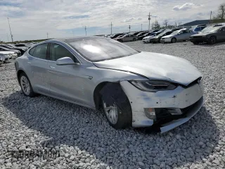 2016 Tesla Model S 90D with VIN 5YJSA1E25GF142104, listed as a Copart auction lot 50874815 with 84,917 mi miles and Salvage Title. Bid and sale history available at DreamBid. Image 4.
